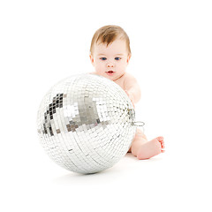 Image showing adorable baby boy with big disco ball