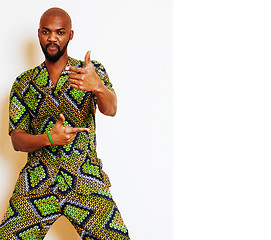 Image showing portrait of young handsome african man wearing bright green nati