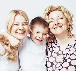 Image showing happy smiling family together posing cheerful on white background, lifestyle people concept, mother with son and teenage daughter isolated 