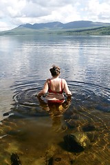 Image showing Overweight woman in a lake