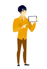 Image showing Smiling businessman holding tablet computer.