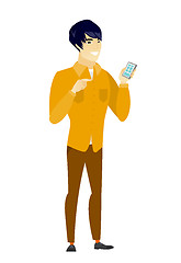 Image showing Asian business man holding a mobile phone.