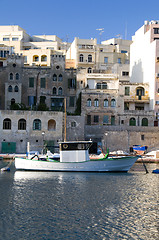 Image showing old fishing boat st. julians harbor real estate overdevelopment