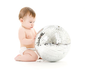 Image showing adorable baby boy with big disco ball