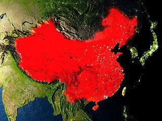 Image showing China in red from space at night