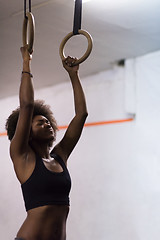 Image showing black woman doing dipping exercise