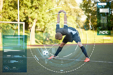 Image showing soccer player stretching leg on field football