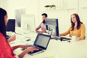 Image showing creative team with computers working at office