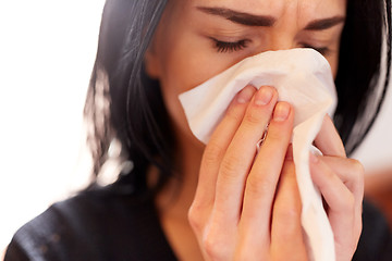 Image showing close up of woman with wipe crying at funeral