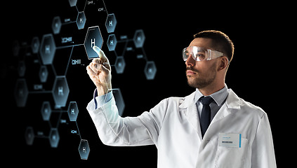 Image showing scientist in goggles with chemical formula