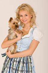 Image showing Bavarian girl with dog