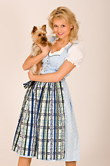 Image showing Bavarian girl with dog