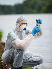 Image showing Laboratory assistant with test tube