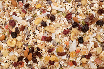 Image showing Muesli background - mixed fruit and nuts with cereal flakes