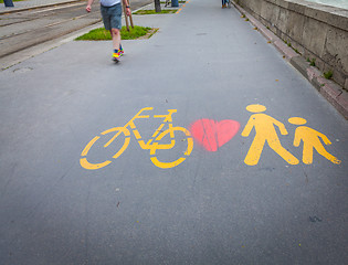 Image showing Bicycle signs painted on asphalt