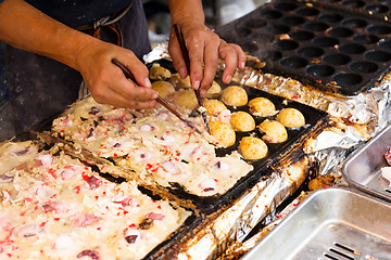 Image showing Cooking of tako yaki