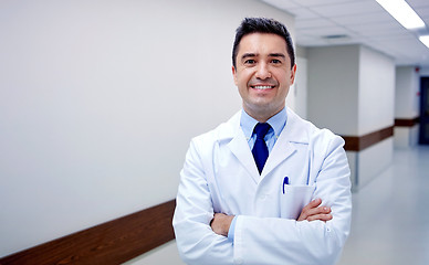 Image showing smiling doctor at hospital corridor