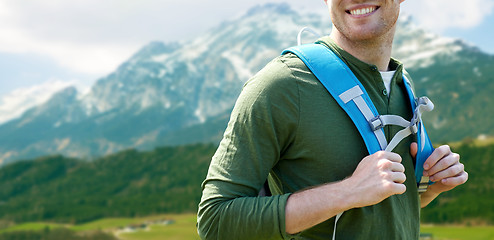 Image showing close up of happy man with backpack traveling