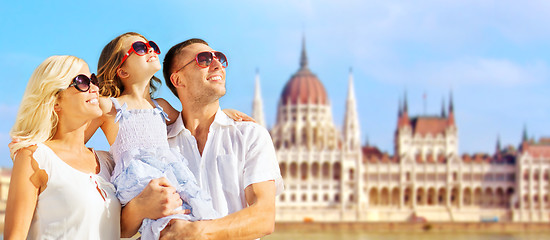 Image showing happy family over house of parliament in budapest