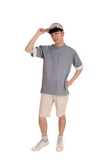 Image showing Happy Asian man standing in shorts.