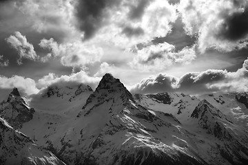 Image showing Black and white view on snow mountains in evening