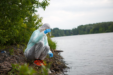 Image showing Photo of chemist in mask