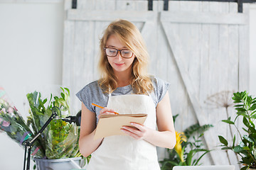 Image showing Portrait of young blond florist