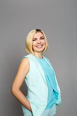 Image showing Smiling blonde on empty background