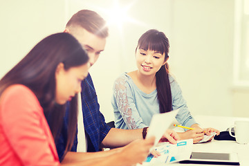 Image showing happy creative team or students working at office