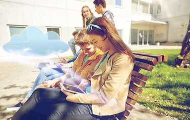 Image showing group of students with tablet pc at school yard