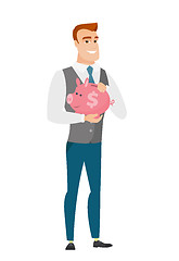 Image showing Caucasian business man holding a piggy bank.