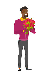 Image showing African-american businessman holding flowers.