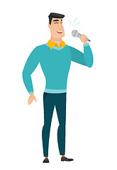 Image showing Caucasian businessman singing to the microphone.