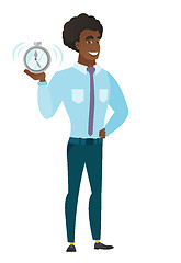 Image showing Caucasian business man holding alarm clock.