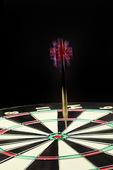 Image showing Darts On A Black