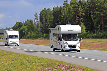 Image showing Two Camper Vans on the Road 