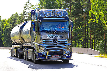 Image showing Mercedes-Benz Actros Truck Xtar Hauls Goods along Road