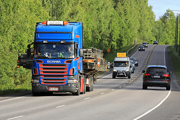 Image showing Scania Semi Hauls Wide Load in Traffic