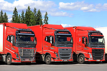 Image showing Group of Three Volvo Trucks Parked