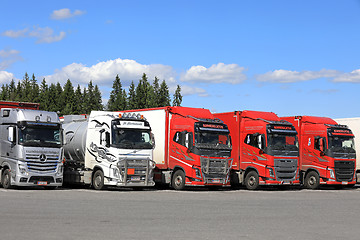 Image showing Row of Trucks at Truck Stop