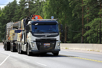 Image showing White Volvo FM Hauls Construction Materials