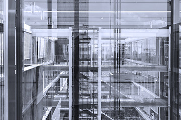 Image showing Abstract window reflections in morden office building.