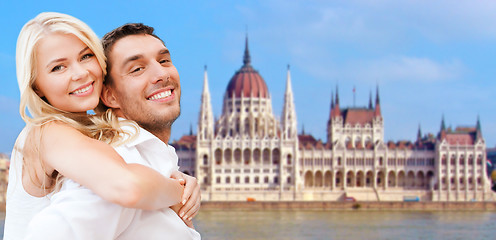 Image showing happy couple over house of parliament in budapest