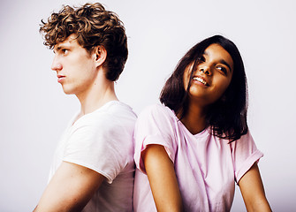 Image showing young couple of mixed races girlfriend and boyfriend having fun on white background, lifestyle teenage people concept