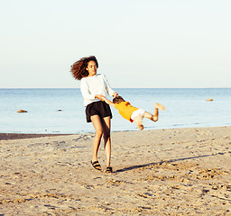 Image showing pretty diverse nation and age friends on sea coast having fun, lifestyle people concept on beach vacations close up