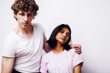 Image showing young couple of mixed races girlfriend and boyfriend having fun on white background, lifestyle teenage people concept