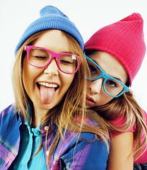 Image showing best friends teenage girls together having fun, posing emotional on white background, besties happy smiling, lifestyle people concept close up. making selfie