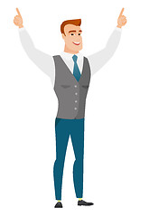 Image showing Businessman standing with raised arms up.