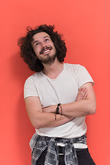 Image showing young man with funny hair over color background