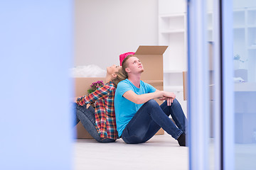 Image showing young couple moving  in new house